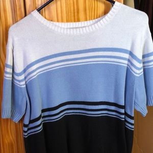 White blue and black sweater